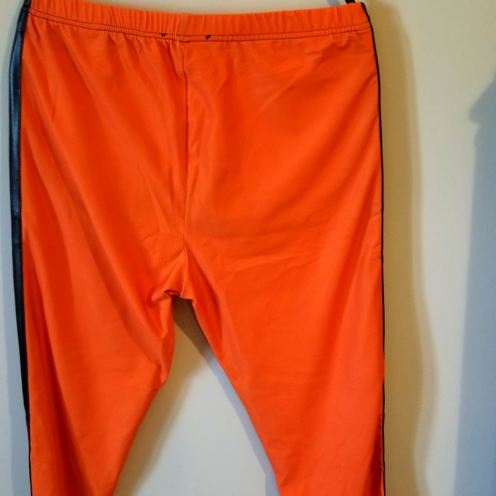 Orange with black strip leggings.